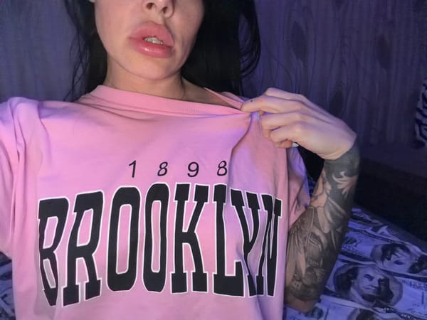 Casual photo session in a Ufa apartment, pink outfit throughout.