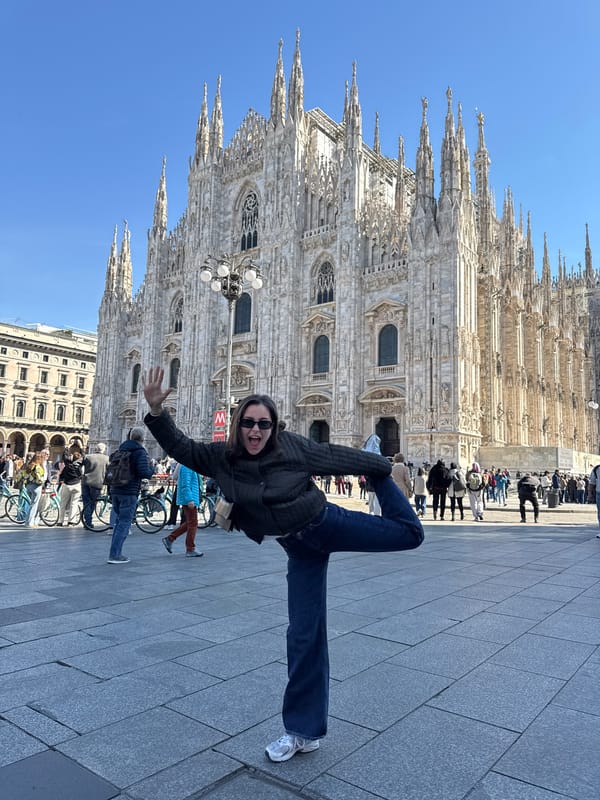 Tourists document Milan's iconic landmarks during morning sightseeing