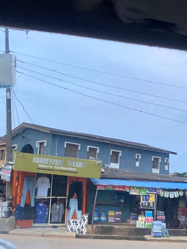 Street-level commerce and traffic in Ikorodu, Nigeria