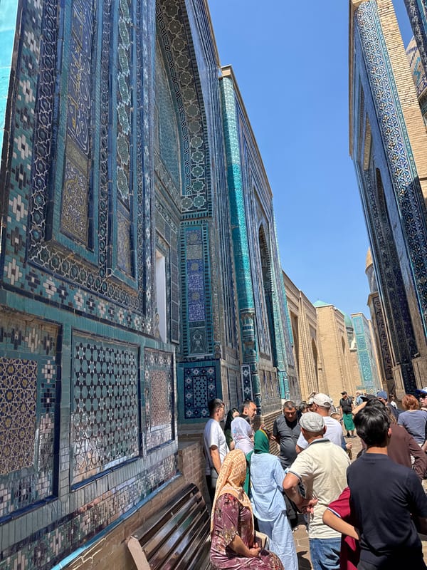 Morning tourists explore historic Samarkand necropolis and madrasah sites