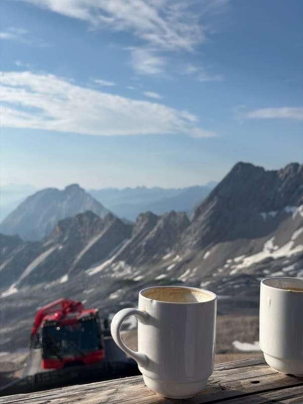 Coffee and alpine peaks at dawn in Garmisch-Partenkirchen