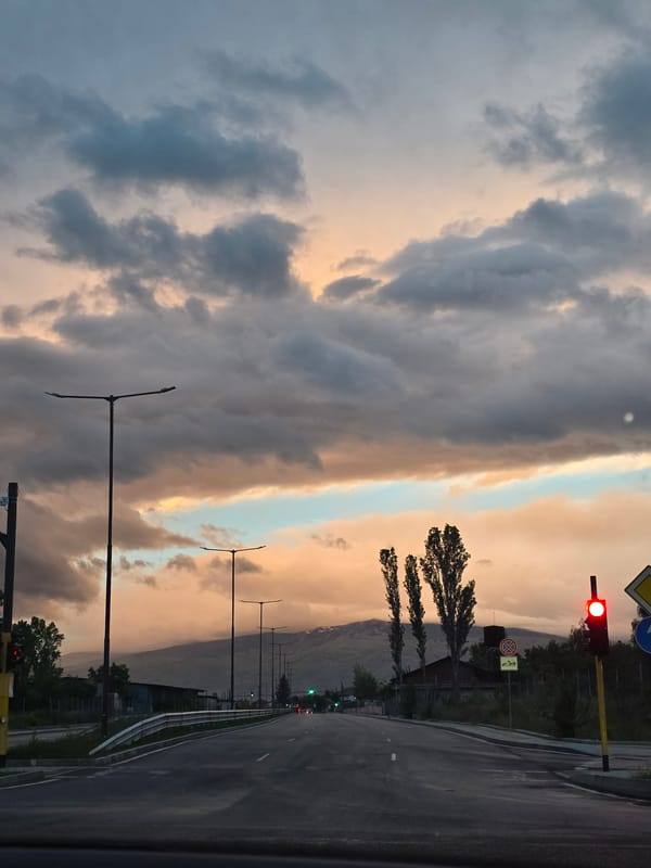 Dramatic sunset sky observed over Sofia street scene