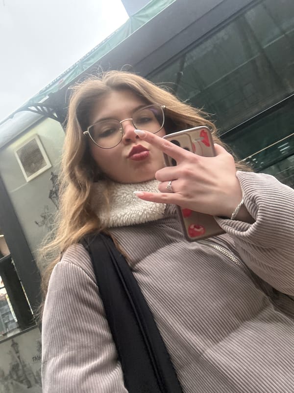 Woman takes selfie in Pernik, Bulgaria