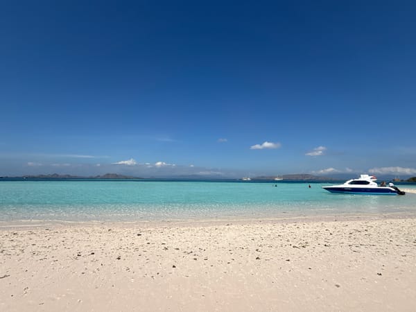 Beach activity documented at Komodo, Indonesia during morning hours