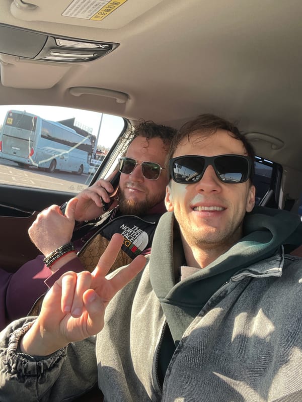 Morning car ride captured in Kudrovo with coffee stop