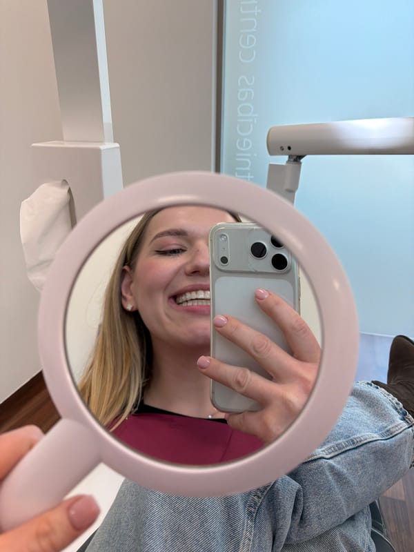 Patient documents dental visit with selfies in Riga clinic