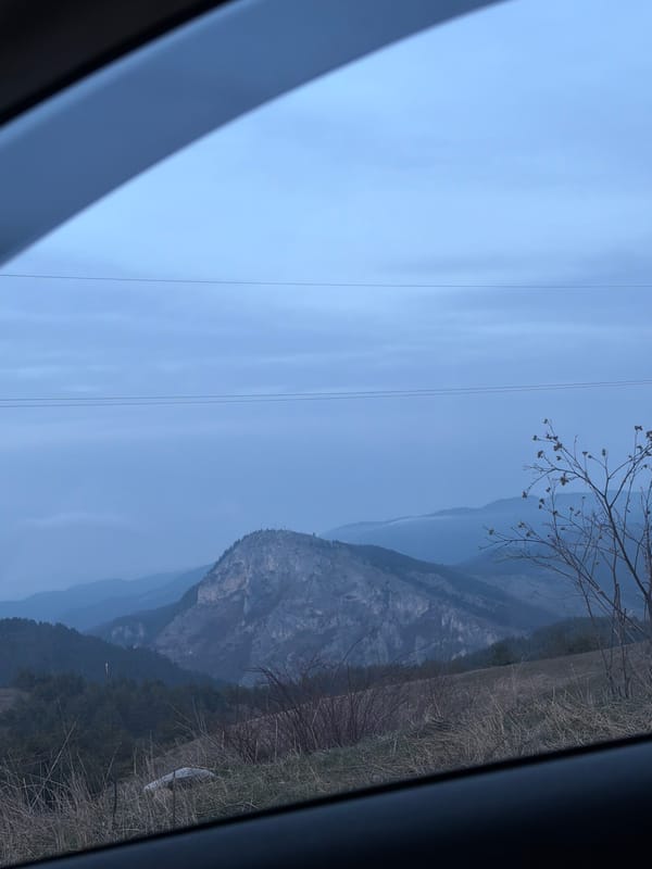 Silver Škoda parked on mountain road near Chala, Bulgaria