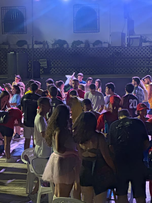 Nighttime street party lights up a plaza in Blanca, Spain