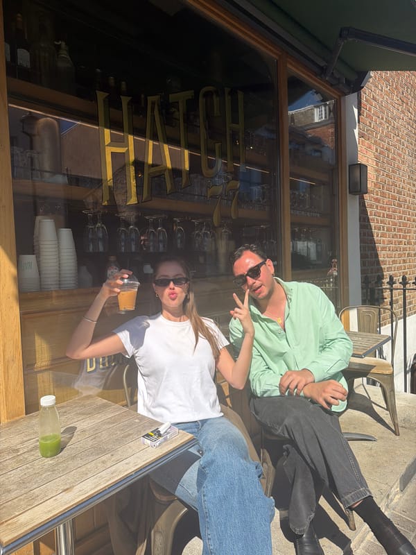 Couple enjoys sunny day at outdoor cafe