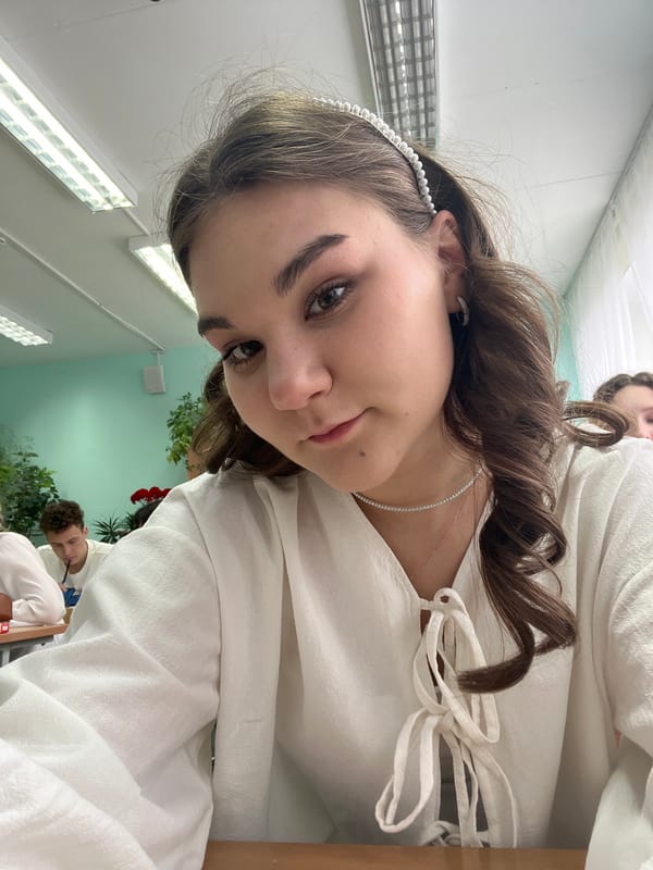 Portrait of young woman in vintage attire captured in Chaikovsky