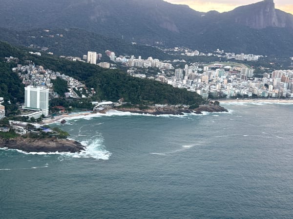 Aerial view captures Rio coastline and Vidigal favela
