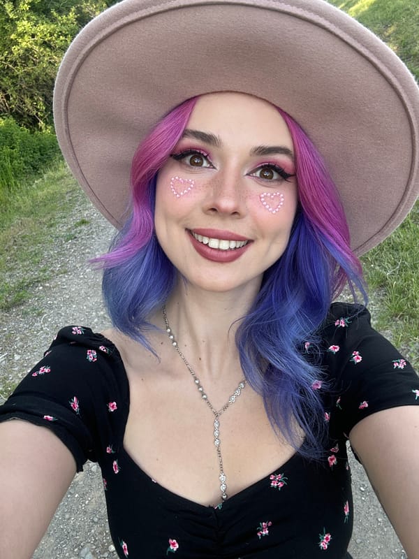 Woman takes cheerful selfies in Zagreb park on sunny afternoon
