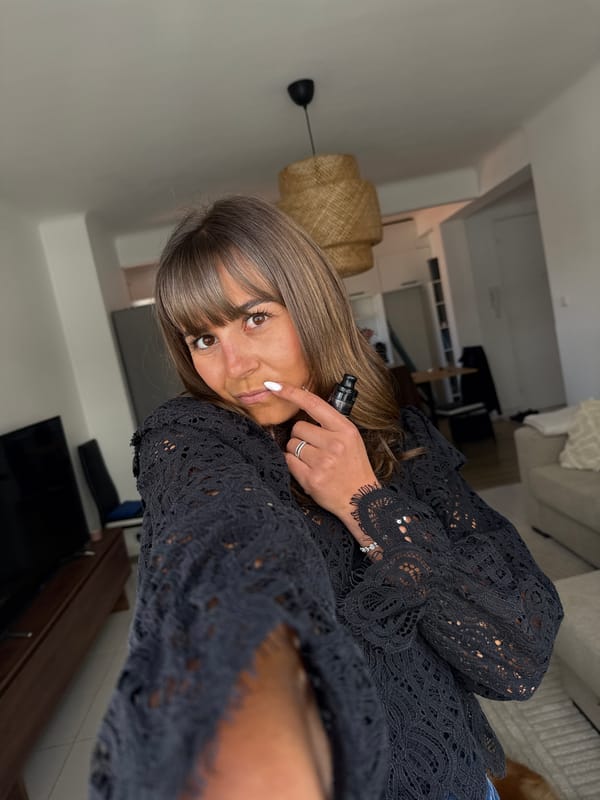 Indoor moments captured in Cannes featuring woman vaping, Pomeranian dog