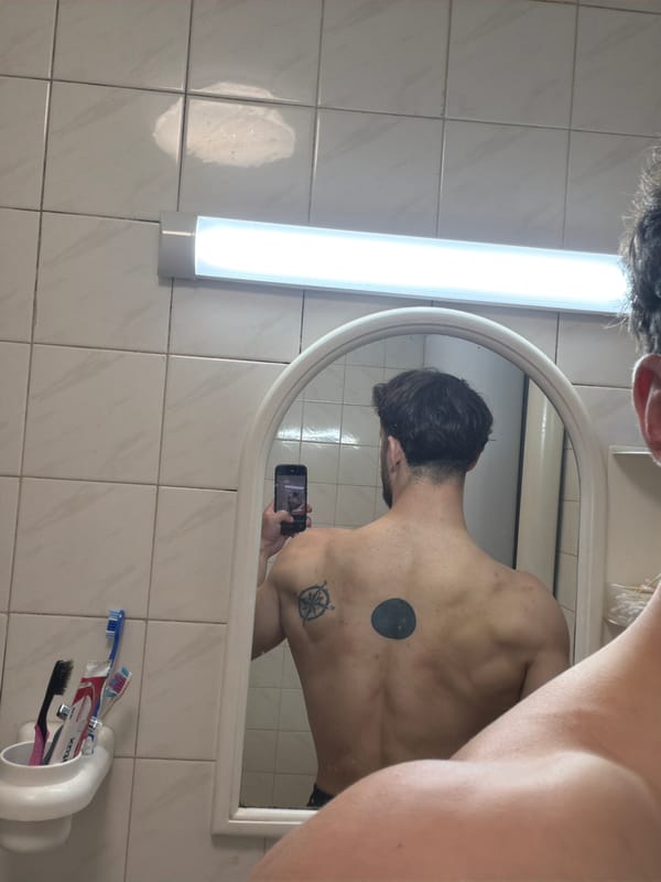 Person takes mirror selfie in Tsarevo bathroom