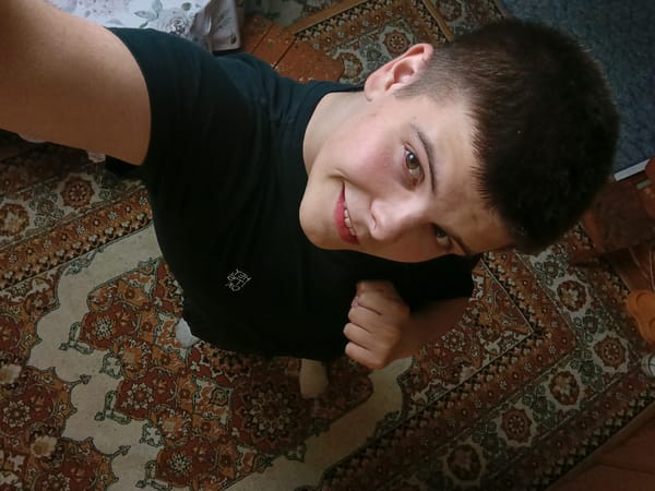 Young man's evening moments captured in Красный Маяк home