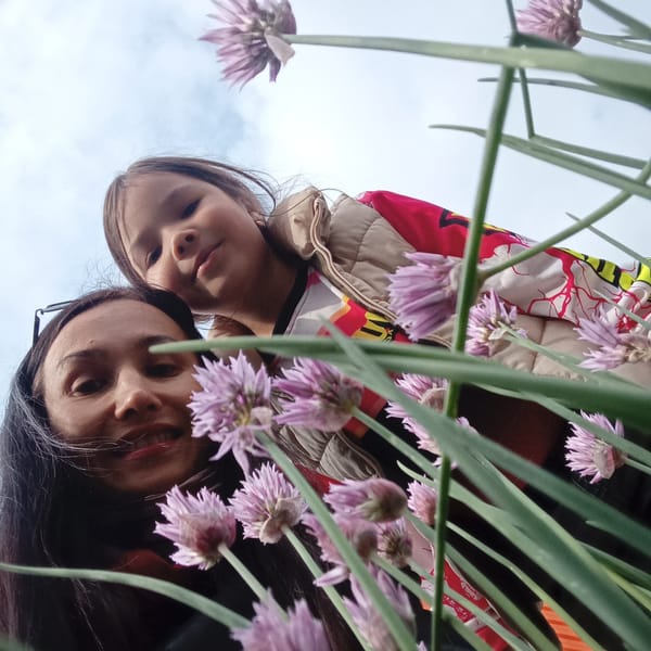 Mother and daughter enjoy afternoon activities in Pervomaysky, Russia