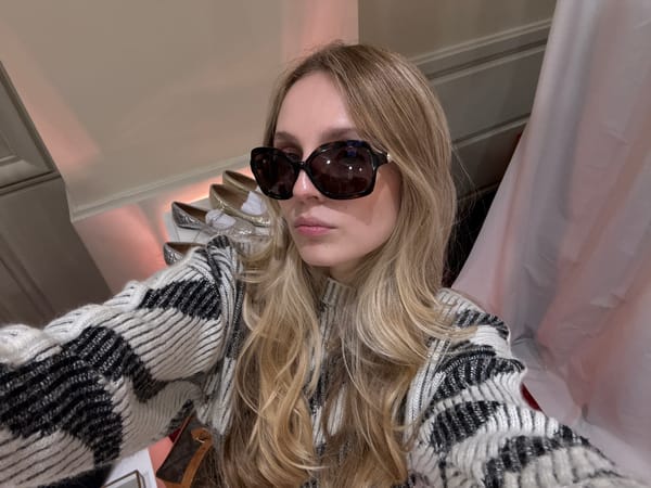 Shopper takes selfies while browsing Mexico City boutique