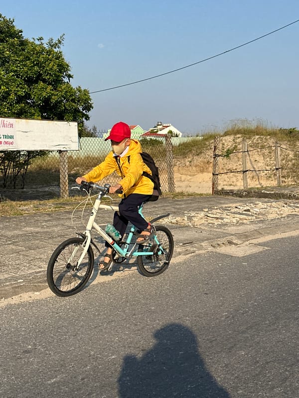 Young cyclist rides through Đà Nẵng streets
