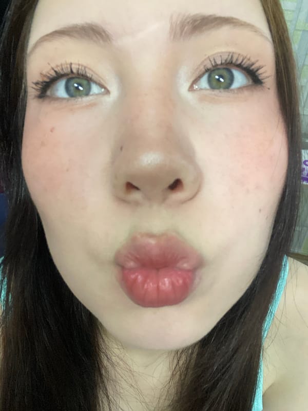 Woman Takes Late Night Selfies With Gold Phone