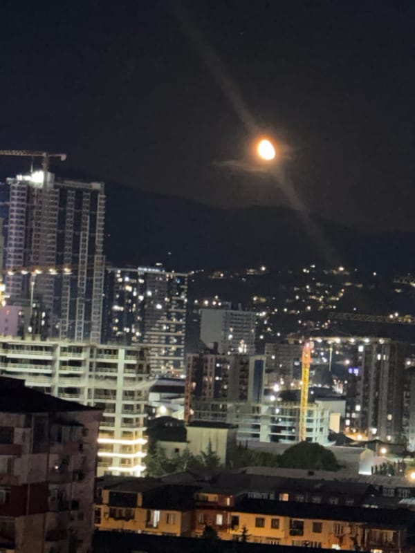 Nighttime urban views captured in illuminated Batumi, Georgia