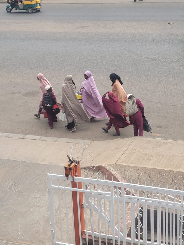 Daily life unfolds across Jos, Nigeria streets and shops