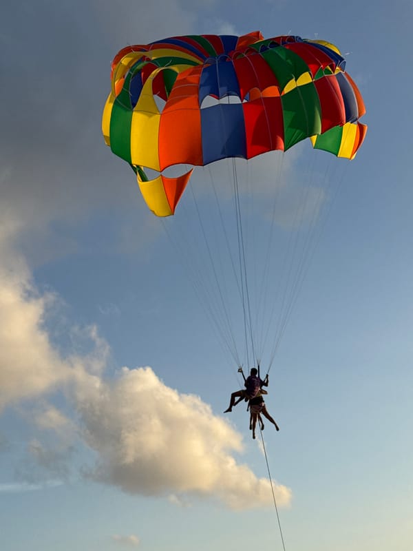 Patong Beach afternoon: parasails, sunset, and shoreline moments