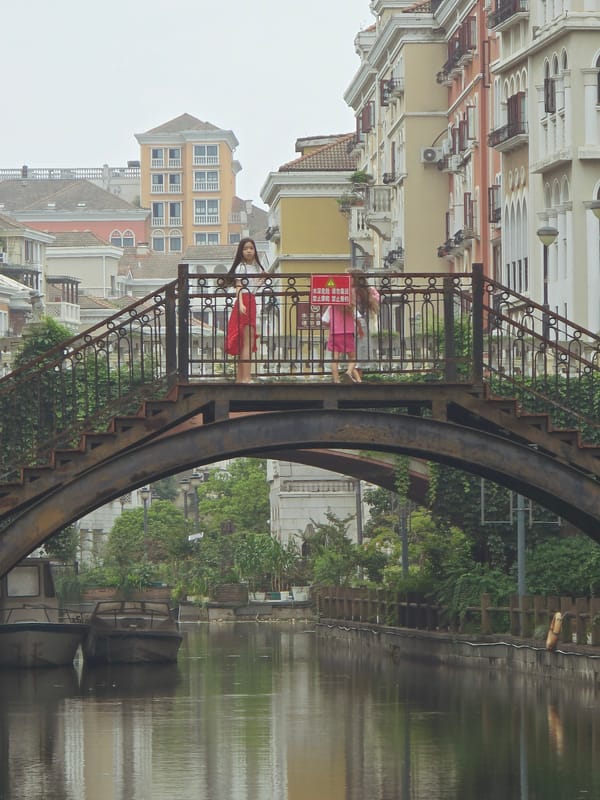 Morning stroll through European-styled canal community in Xiaoshan District