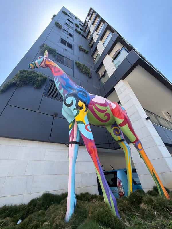 Colorful giraffe sculpture spotted on building in Bat Yam