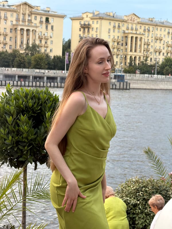 Waterfront scene in Moscow with flowers and city backdrop