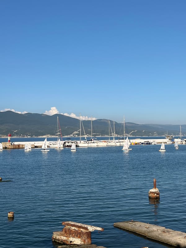 Novorossiysk harbor and beach on a calm summer afternoon