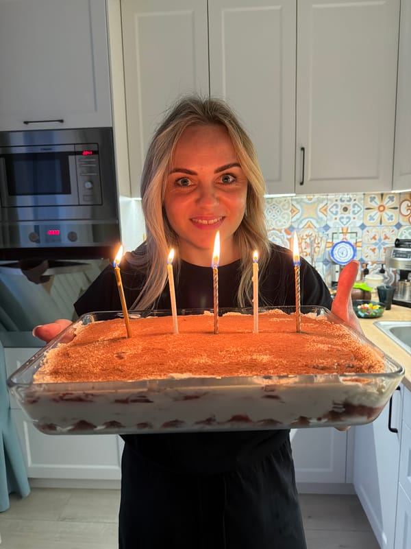 Woman celebrates birthday with tiramisu cake in Votkinsk kitchen