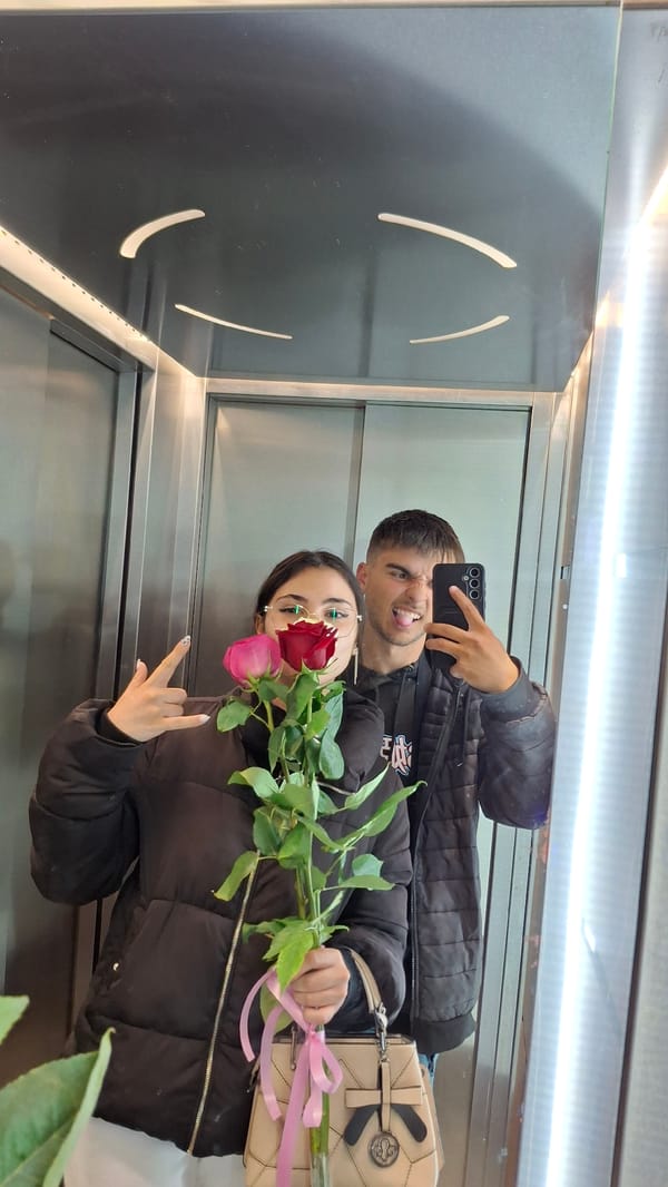 Couple Takes Selfie with Roses in Varna Elevator