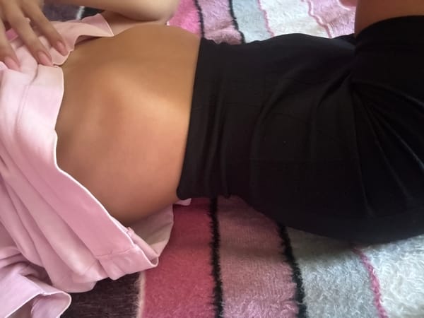 Multiple close-up angles of someone resting on a striped blanket