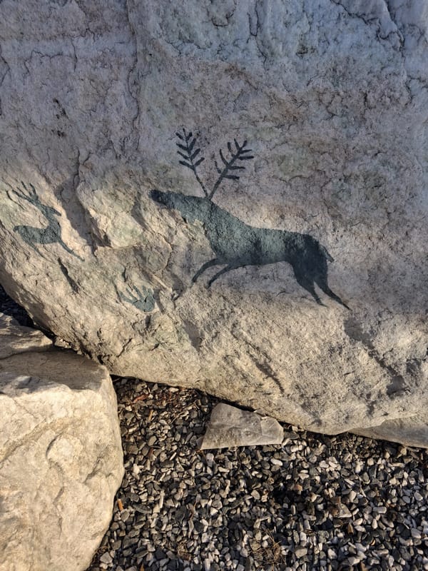 Ancient rock art featuring hunting scenes documented in Kultuk