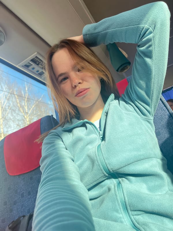 Woman travels on condensation-fogged public transit in Berezniki