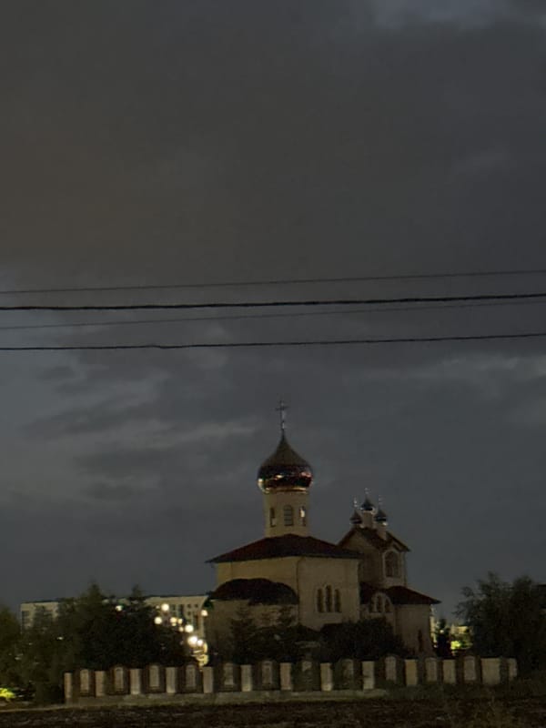 Midsummer dusk settles over Mikhaylovsk, Russia