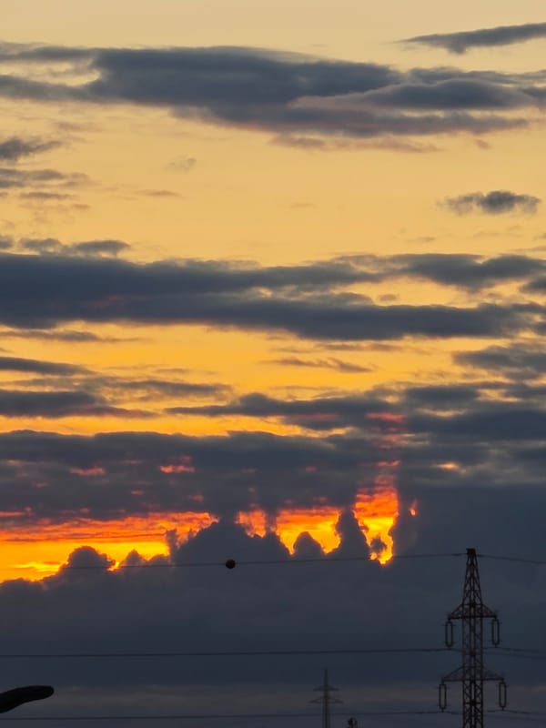 Dramatic sunset lights up Prague sky with fiery colors