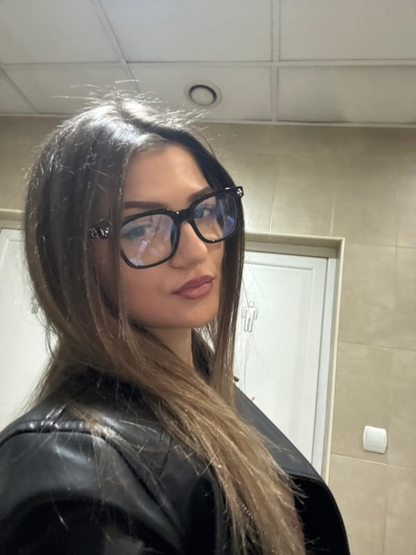 Woman takes selfie in Sofia public restroom