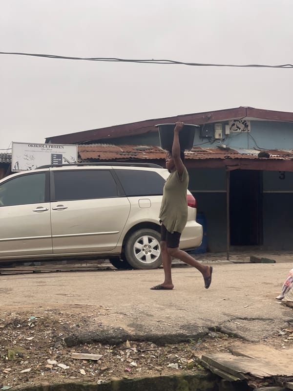 Morning street life and trade in Akowonjo, Lagos