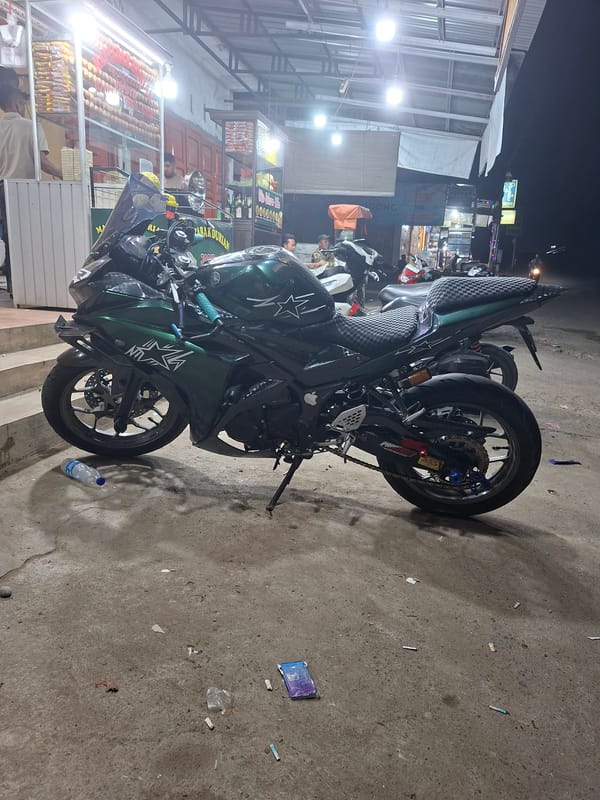 Motorcycle parked at food stall in Keudegeudong, Indonesia
