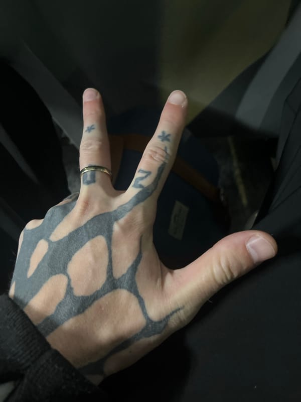 Tribal tattoo on hand documented in Cordoba, Argentina