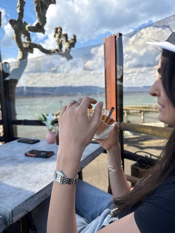 Lakefront dining scene captured in Corsier, Switzerland