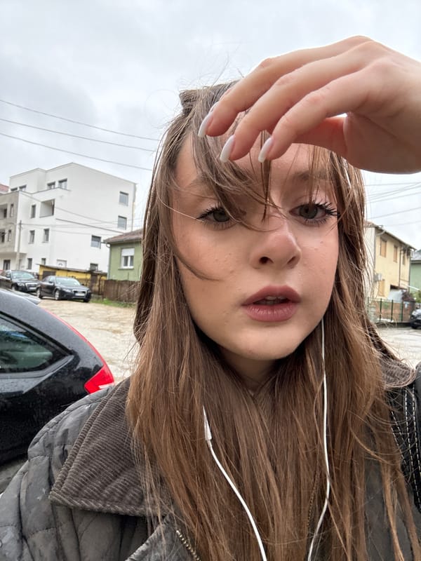 Woman takes selfies on residential street in Kragujevac