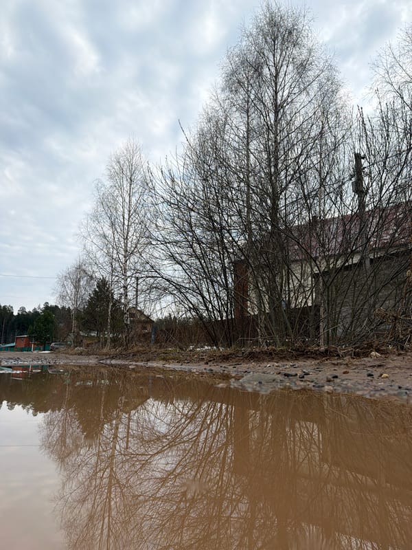 Woman takes selfie near abandoned building in Chaikovsky