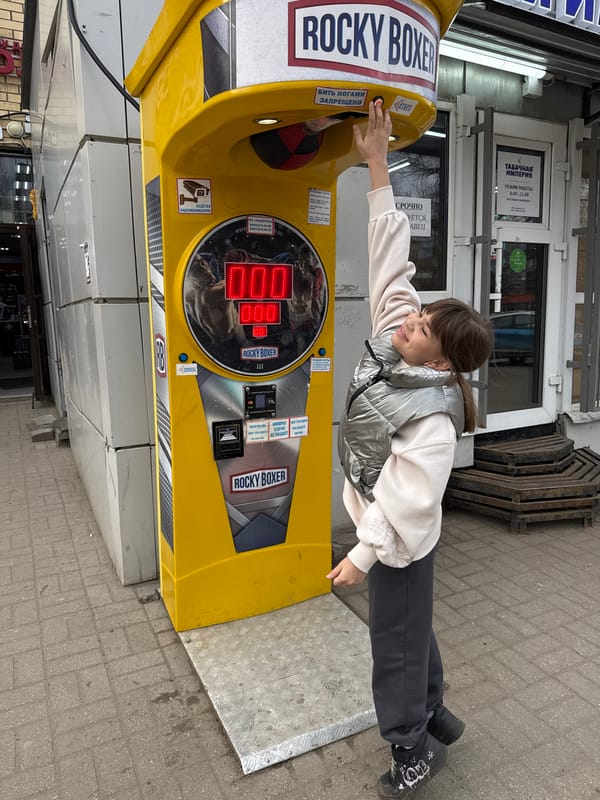 Family life documented in Rusanovo during April afternoon