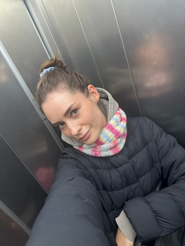 Woman takes multiple selfies around Kiel, Germany