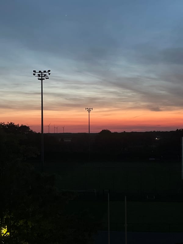 Twilight colors observed over Mönchengladbach sports field