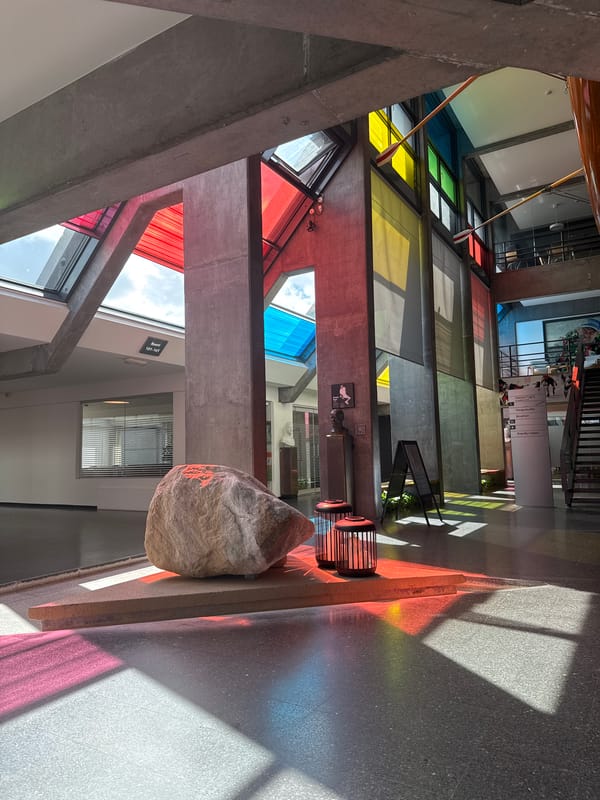 Morning light illuminates Kunststation 100 atrium in Glostrup