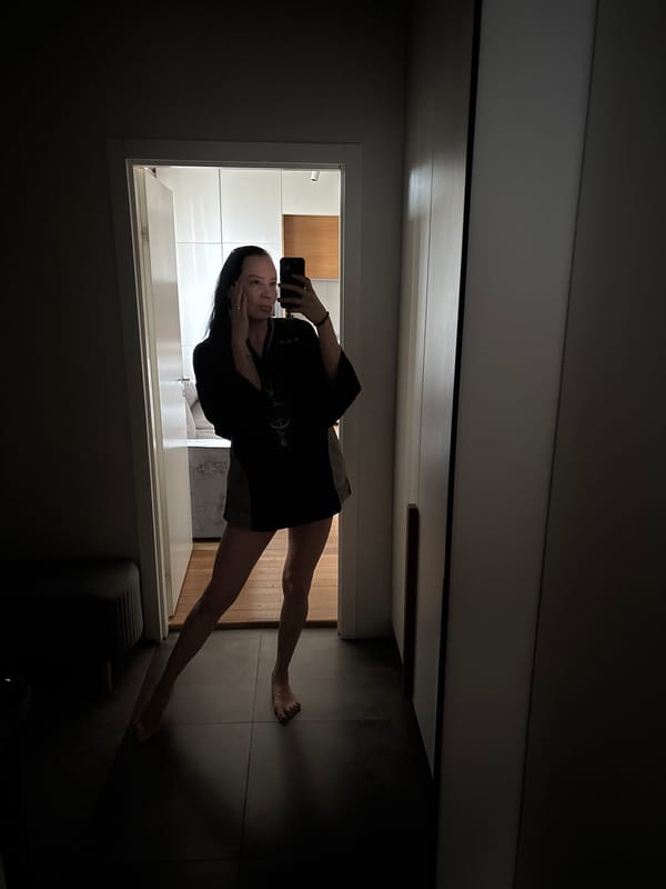Woman takes selfie in doorway in Chaikovsky, Russia