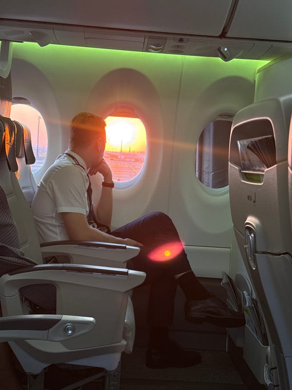 Aboard an airBaltic flight at Vienna Airport, dusk departure